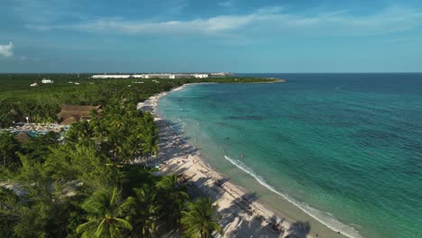 Aerial-view-around-a-paradise-beach-in-Playa-del-carmen,-Mexico---circling,-drone-shot