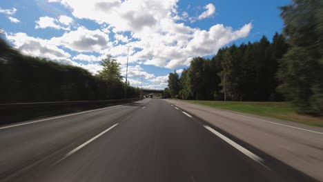 Hyperlapse-POV:-Driving-on-suburban-divided-highway-on-sunny-day