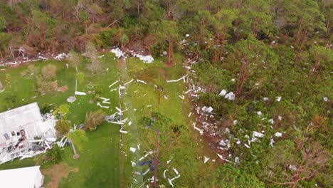 4K-Drone-Video-of-Debris-in-Trees-from-Homes-Destroyed-by-Hurricane-Ian-in-North-Port,-Florida---20