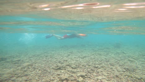 Father-Son-Snorkeling-In-Hanauma-Bay-Hawaii-Exploring-Tropical-Reef-Fish