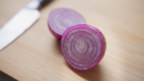 A-chopped-red-onion-sits-on-a-chopping-board