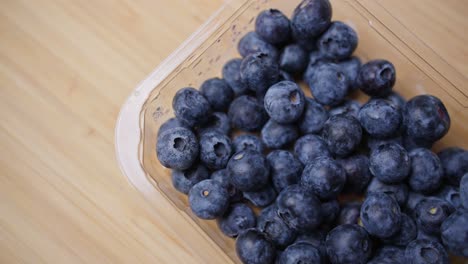 Blueberries-dropping-into-a-punnet