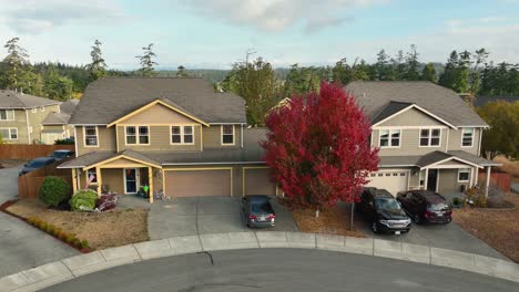 Orbiting-aerial-view-of-a-suburban-residence-during-Autumn