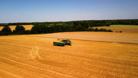 Aerial-view-of-agricultural-machine-working-in-a-farmland