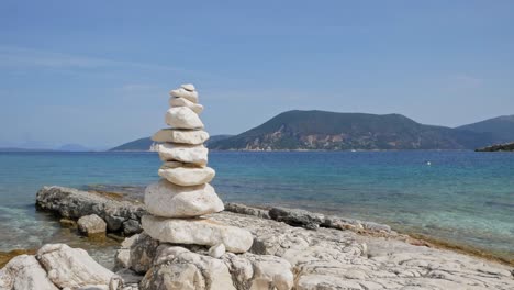 Stone-Stack-And-Scenic-Ocean-In-Paralia-Emplisi-Beach-In-Greece---static-shot
