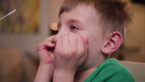 Little-boy-is-scared-to-get-a-nasal-swab-for-a-covid-19-rapid-response-test