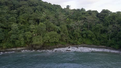 The-secluded-playa-la-Macha-near-Quepos,-Costa-Rica-at-high-tide