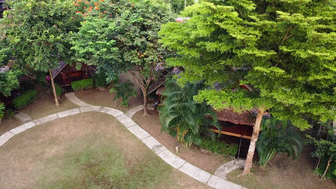 Premium Stock Video Aerial Thai Tree Houses Outside The Village Of