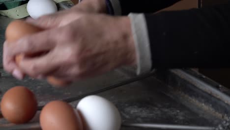 Close-up-sorting-eggs-for-packaging-at-a-small-farm