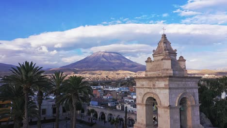 Arequipa-bell-tower-cathdral-and-volcano-drone
