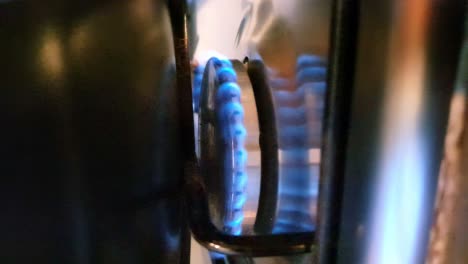 Close-Up-Of-A-Gas-Cooker-Blue-Flame-Burning