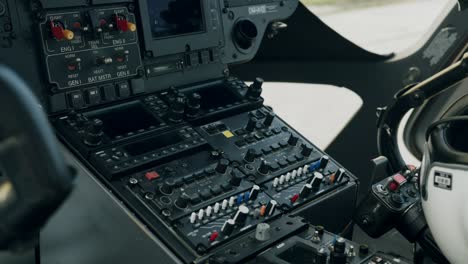 Control-panel-inside-helicopter-cockpit---dolly-shot