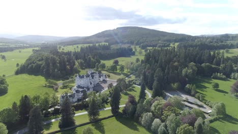 High-aerial-push-in-shot-towards-Blair-Castle-on-a-sunny-day