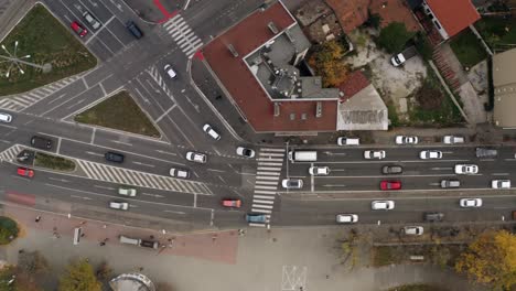 Aerial-top-shot-of-cars-traffic-driving-Racianske-myto-intersection-in-Bratislava,-Slovakia