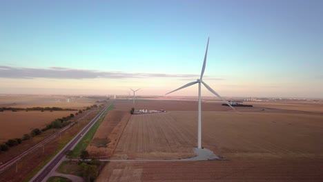 Wind-mill-Turbines-Spin-Creating-Green-Renewable-Clean-Energy-Electricity-With-Net-Zero-Greenhouse-Gas-Carbon-Footprint-Emissions-To-Reduce-Climate-Change-In-Wheat-Fields-Of-Nebraska-Stock-Video-#6
