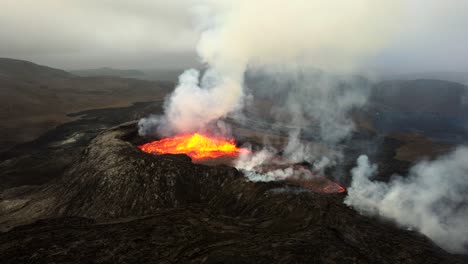 Drone-footage-from-the-eruoption-site-at-Fagradallsfjall-vulcano,-Iceland