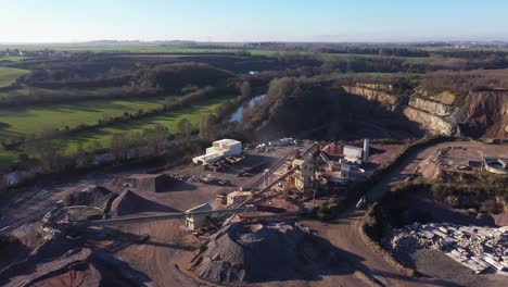aerial-view-of-a-sand-quarry-in-normandy-beside-the-orne-river