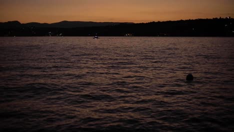 Dusk-light-reflecting-on-the-water-surface-of-the-sea-lake
