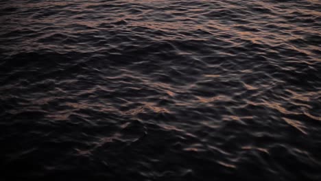 Sunset-light-reflecting-on-the-water-surface-of-the-sea-lake