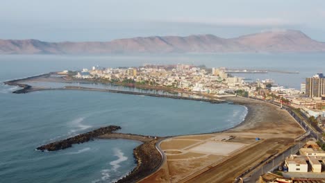 Drone-Aerial-footage-of-the-tip-of-coastal-city-of-Callao-in-Peru