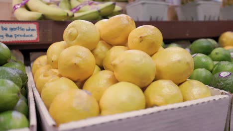 Fresh-Ripe-Box-of-Lemons-at-Farmer's-Market-Grocery-Store-Supermarket
