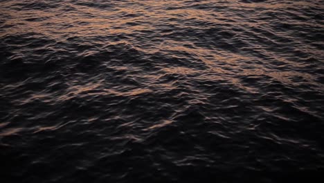 Dusk-light-reflecting-on-the-water-surface-of-the-sea-lake