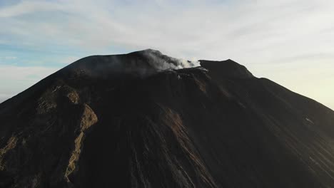 Drone-Footage-Of-Stromboli-Volcano-In-Mediterranean,sunset