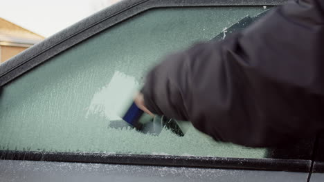 Scraping-ice-off-car-window