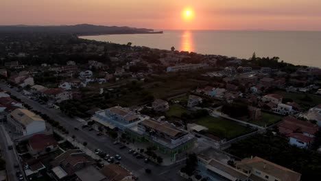 Aerial-view-of-acharavi-vilage-in-summer-with-sunset