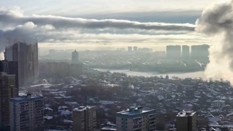 Aerial-Time-Lapse-Of-Fast-Changing-Cloudscape-Over-City-In-Winter