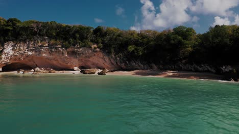 Remote-sea-caves-on-secluded-beach-in-the-Caribbean