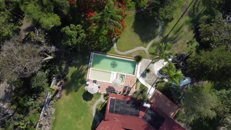 Big-house-with-garden-and-pool,-aerial-shot