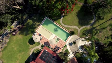 Aerial-shot-of-a-beautiful-house-with-pool