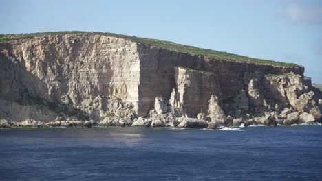 Steep-Limestone-Island-Shore-in-Mediterranean-Sea-near-Malta