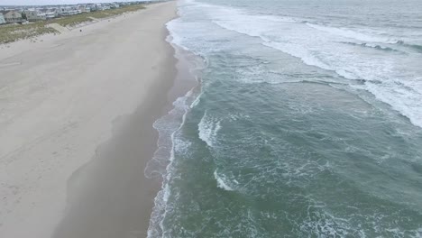 Drone-view-of-Waves-on-a-beach-in-New-Jersey