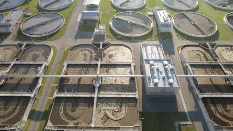 Aerial-trucking-shot-of-the-aeration-basins-and-sedimentation-basins-in-huge-water-clarifying-plant