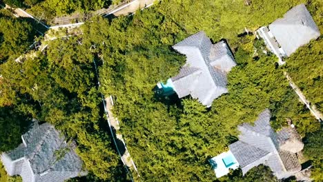 Fantastic-bird's-eye-view-top-view-rotation-360-drone-shot-of-a-luxury-pool-jungler-villa