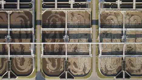 Aerial-top-down-shot-of-the-aeration-basins-in-the-huge-wastewater-treatment-plant