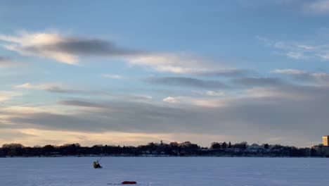 Extreme-winter-sport,-Snow-kite-over-a-frozen-lake-Minneapolis