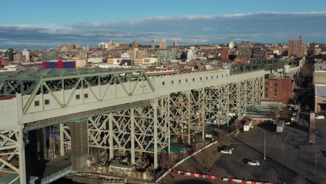 Aerial-footage-of-the-elevated-train-tracks-of-the-Culver-Overpass-at-9th-Street-in-Brooklyn-New-York-City