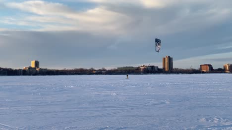 Snow-kite-on-a-frozen-lake,-Minnesota-winter-sports