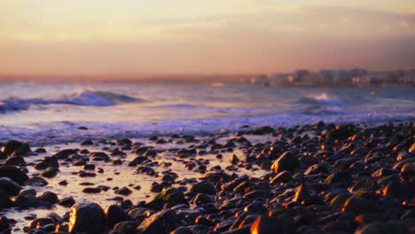 Waves-and-rocks-at-the-shore-after-sundown