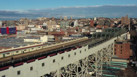 Aerial-footage-across-the-elevated-train-tracks-of-the-Culver-Overpass-at-9th-Street-in-Brooklyn-New-York-City