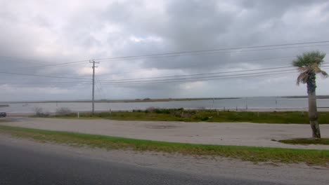 POV-while-driving-past-small-spoil-islands-in-upper-Laguna-Madre-and-onto-Kennedy-Memorial-Causeway-near-Corpus-Chrisi-Texas