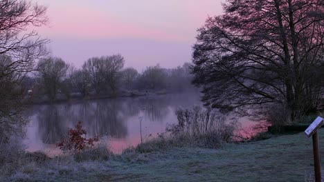Video-of-dark-and-foggy-Nunnery-Lake-at-sunrise-in-Thetford,-Norfolk,-UK-in-timelapse