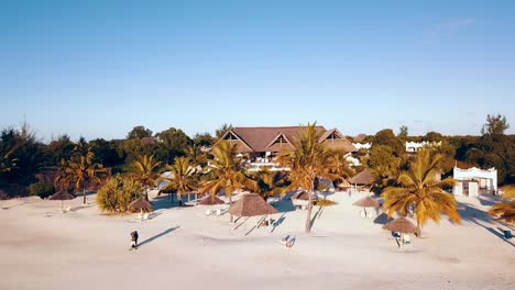 Unbelievable-backwards-slowly-rise-up-drone-shot-at-sunset-long-shadows-from-a-luxury-villa-to-sea
Drone-shot-on-Zanzibar-at-Africa-in-winter-2019