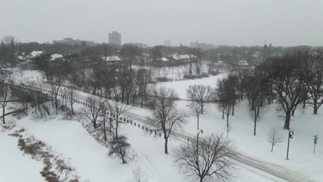 winter-storm-lots-of-snow-on-a-residential-area-winter-minneapolis-mn-lake-of-the-isles