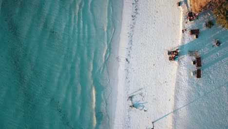 Gorgeous-bird's-eye-view-top-view-and-slowly-forwards-drone-shot-at-sunset-with-long-shadows
Drone-shot-on-Zanzibar-at-Africa-in-winter-2019
