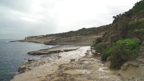 Cloudy-Moody-Day-in-Winter-in-Stone-Beach-Il-Kalanka-in-Malta