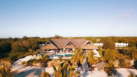 1-Million-backwards-slowly-rise-up-drone-shot-from-a-luxury-villa-with-perfect-pool-over-palmtrees
Drone-shot-on-Zanzibar-at-Africa-in-winter-2019